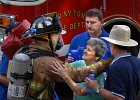 HouseFire-Wright--1b copy  Andy Wright, a Duncan volunteer firefighter, hugs his grandmother Geraldine Wright, after helping to work his grandparents&#39; house fire in Whitney Friday morning, 5-26-06. Spartanburg County Sheriff Chuck Wright&#39;s (back) parents (Geraldine and Charles Wright, at right) were not hurt in the blaze, but their home was heavily damaged. Firefighters from Whitney, Drayton, Hilltop, and Cherokee Springs responded to the fire.
